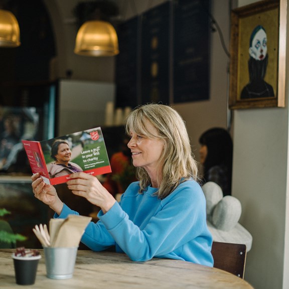 Lady reading Wills guide